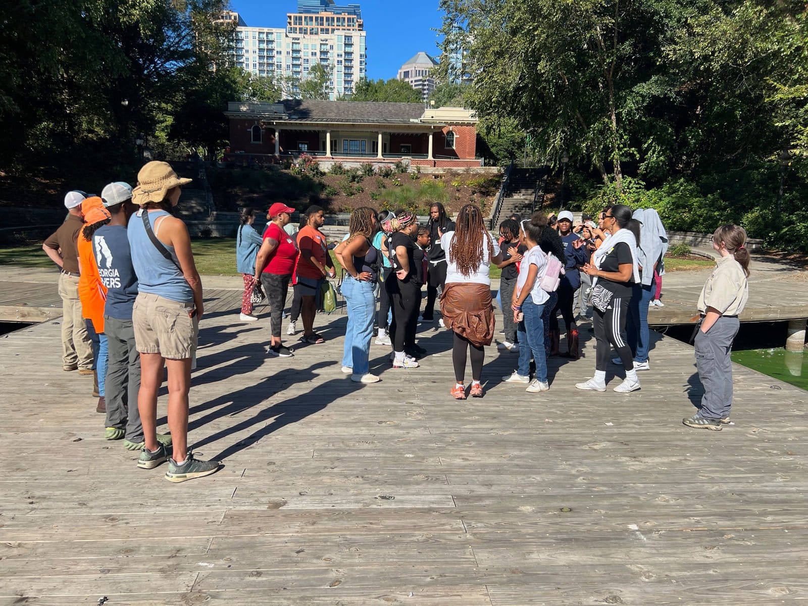 A community group gathered on a dock before a day on the water
